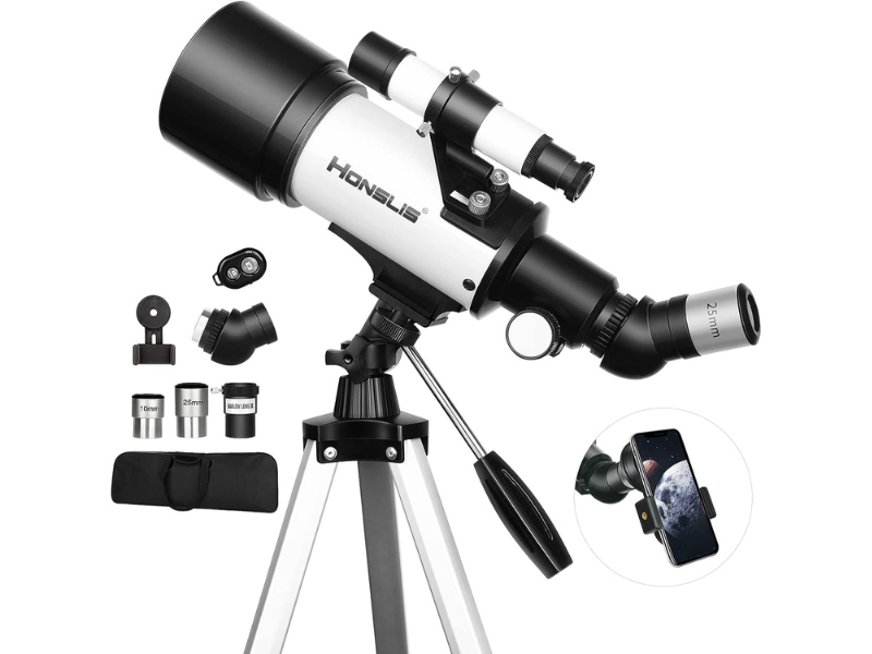 Telescope with smartphone mount and various accessories on a tripod