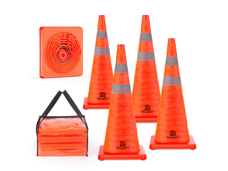Four bright orange traffic cones with reflective stripes and a storage bag