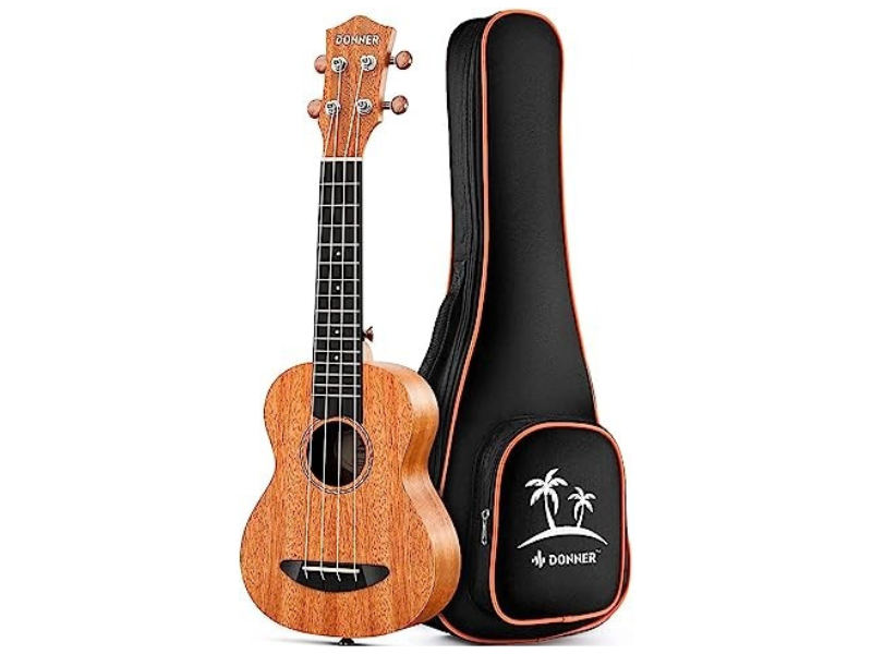 A wooden ukulele next to a black carrying case