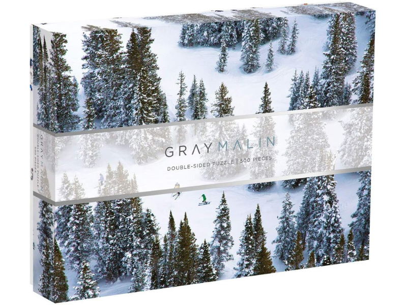 Gray Malin double-sided puzzle featuring snowy landscape and trees