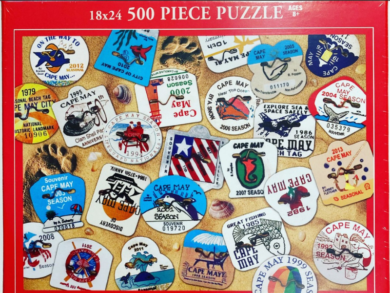Colorful puzzle pieces featuring Cape May souvenir tags and designs