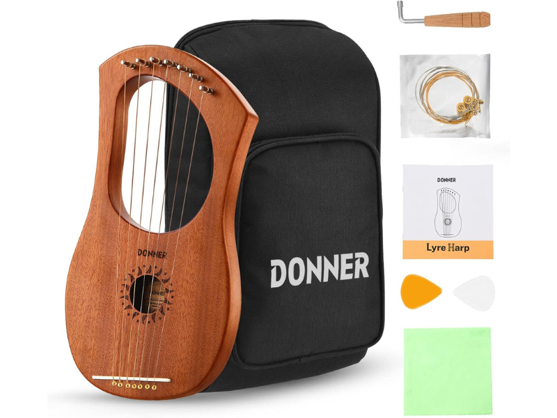 Lyre harp with accessories and carrying case displayed together